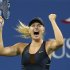 Maria Sharapova of Russia celebrates match point to defeat Nadia Petrova of Russia during their match at the US Open