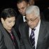 Palestinian President Mahmoud Abbas, right, is greeted by Hanan Ashrawi, left, legislator and activist, as he arrives at his hotel in New York, Monday, Sept. 19, 2011, to attend the 66th General Assembly session of United Nations, which begins Tuesday, Sept. 20. The United States and Europe scrambled Sunday, Sept. 18, for a strategy that would help avoid a showdown over whether to admit an independent Palestine as a new United Nations member. (AP Photo/David Karp)