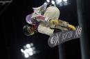 Shaun White of the United States gets air during a snowboard half pipe training session at the Rosa Khutor Extreme Park at the 2014 Winter Olympics, Monday, Feb. 10, 2014, in Krasnaya Polyana, Russia. (AP Photo/Sergei Grits)