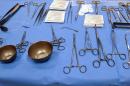 Surgical instruments sit on a table in an operating theater at the Cardiology Hospital in Lille, northern France, on April 2, 2013