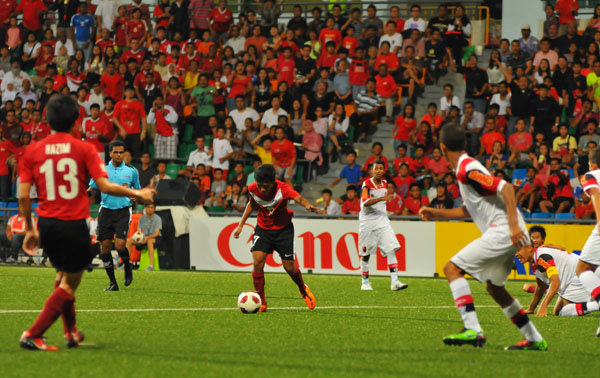 Muhaimin Suhaimi scores for Singapore. (Photo by Muse PR)