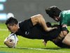 New Zealand All Blacks' Williams crashes over for a try as he is tackled by Ireland's Murray during their international rugby test match in Hamilton