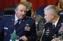 NATO's Supreme Allied Commander, Europe or SACEUR, U.S. Gen. Philip M. Breedlove, left , and U.S. Army Commander for International Security Assistance Forces (ISAF), Gen. John F. Campbell attend on NATO Military Committee Conference in Vilnius, Lithuania, Saturday, Sept. 20, 2014. (AP Photo/Mindaugas Kulbis)