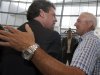 Dale Jarrett, right, is congratulated by NASCAR president Mike Helton, left, after being named to the next class of inductees during an announcement at the NASCAR Hall of Fame in Charlotte, N.C., Wednesday, May 22, 2013. (AP Photo/Chuck Burton)