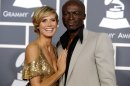 FILE - In this Feb. 13, 2011 file photo, Heidi Klum, left, and Seal arrive at the 53rd annual Grammy Awards in Los Angeles. Klum filed for divorce Friday, April 6, 2012, in Los Angeles, citing irreconcilable differences for the end of her marriage to singer Seal. The couple married in 2005 and has four children together, including the supermodel's daughter from a previous relationship. (AP Photo/Chris Pizzello, File)