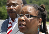 Shawnna Hayes-Tavares, a mother of three Atlanta public school students, speaks to reporters at a news conference in Atlanta, Wdnesday July 213, 2011. Two of her children schools identified a state investigation in cheating on a standardized test. A new state report reveals how far some Atlanta public schools went to raise test scores in the nation’s largest-ever cheating scandal. The scandal first came to light two years ago. Now, investigators have concluded that nearly half the city’s schools allowed cheating to go unchecked for as long as a decade, beginning in 2001. (AP Photo/John Bazemore)