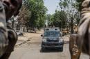 Troops patrol in the city of Bama, northeast Nigeria, on March 25, 2015