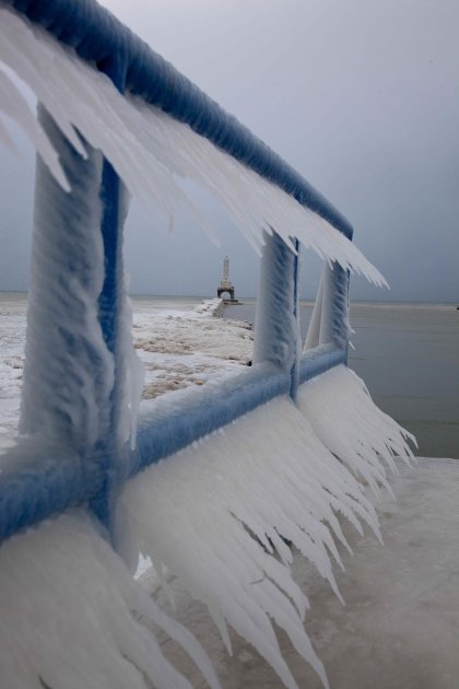 Icicles form on a walkway along Lake Michigan in Port Washington, Wi., Tuesday, Feb. 1, 2011, in Milwaukee. (AP Photo/Jeffrey Phelps)