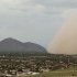 A dust storm moves to consume Camelback Mountain in Phoenix, Ariz., Thursday August 18, 2011.(AP Photo/The Arizona Republic, Pat Shannahan)  MARICOPA COUNTY OUT; MAGS OUT; NO SALES