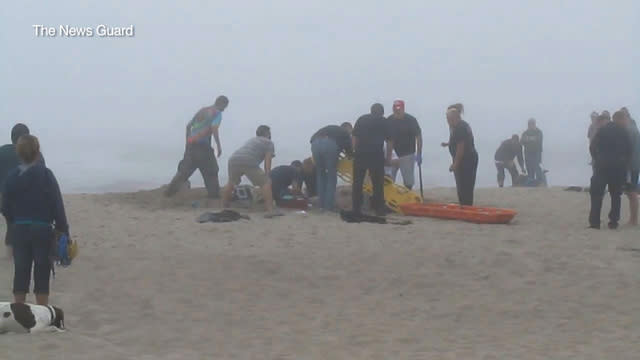 Rescuers try to dig girl out of Oregon sand cave