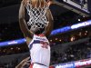 Washington Wizards center Emeka Okafor (50) dunks against Charlotte Bobcats forward Michael Kidd-Gilchrist, right, during the second half of an NBA basketball game, Saturday, March 9, 2013, in Washington. The Wizards won 104-87.(AP Photo/Nick Wass)
