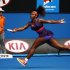Serena Williams of the U.S. hits a return to Garbine Muguruza of Spain during their women's singles match at the Australian Open tennis tournament in Melbourne