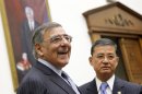 Defense Secretary Leon Panetta, left, and Veterans Affair Secretary Eric Shinseki arrive on Capitol Hill in Washington, Wednesday, July 25, 2012, to testify before the joint House Armed Services and Veterans Affairs Committee "Back from the Battlefield" hearing. (AP Photo/Haraz N. Ghanbari)
