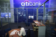 <p>               FILE - This Oct. 13, 2011 file photo, shows a Citibank branch in New York. Citigroup reported Monday, April 16, 2012, a profit of $2.9 billion for the first three months of the year. The bank says it collected record revenue from processing international transactions by other companies. It was hurt by an accounting charge of $1.3 billion as the value of its debt increased. (AP Photo/Mark Lennihan, File)