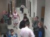 In this photo made taken from Feb. 4, 2012 security camera footage provided by Bismarck Schools, a man identified as 28-year-old Sherwin Shayegan of Bothell, Wash., dressed in a basketball uniform, stands in a hallway at Century High School in Bismarck, N.D. Dubbed the Piggyback Bandit, Shayegan crashed school sporting events in at least five states from Washington to Minnesota, in some cases coaxing players to give him a piggyback ride. (AP Photo/Bismarck Schools)