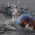 American endurance swimmer Diana Nyad , 61, swims in Cuban waters, offshore Havana, Cuba, Sunday, Aug. 7, 2011. Nyad jumped into Cuban waters Sunday evening and set off in a bid to become the first person to swim across the Florida Straits without the aid of a shark cage. (AP Photo/Franklin Reyes)