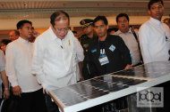 President Benigno Aquino III inspects the solar-powered aerator project of Adamson University. During the launch of the National Renewable Energy Program, Aquino vowed the Philippines will increase its use of renewable energy sources.
