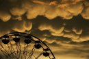 AP10ThingsToSee - Mammatus clouds move over the Fredericksburg Agricultural Fair after a round of thunderstorms passed through the area on Thursday, Aug. 1, 2013. (AP Photo/The Free Lance-Star, Peter Cihelka, File)