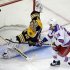 Boston Bruins goalie Tuukka Rask (40) makes a save on a breakaway by New York Rangers right wing Ryan Callahan (24) during the third period in Game 5 of the Eastern Conference semifinals in the NHL hockey Stanley Cup playoffs in Boston, Saturday, May 25, 2013. (AP Photo/Charles Krupa)