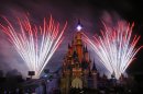 A firework display lights up the castle of Sleeping Beauty in Disneylands theme park in Marne-la-Vallee, east of Paris, Saturday March 31, 2012. This will mark the 20th year since Disneyland opened in Paris in 1992.(AP Photo/Michel Spingler)