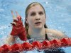 Britain's Rebecca Adlington reacts after taking first place in her women's 400m freestyle heats during the London 2012 Olympic Games at the Aquatics Centre