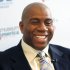 FILE - In this Nov. 21, 2008 file photo, basketball legend turned entrepreneur Magic Johnson tours the Sports Museum of America in New York. A group that includes former Lakers star Magic Johnson and longtime baseball executive Stan Kasten agreed Tuesday, March 27, 2012 to buy the Los Angeles Dodgers from Frank McCourt for $2 billion. (AP Photo/Seth Wenig, File)