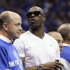 FILE - This June 5, 2011 file photo shows Terrell Owens watching during the second half of Game 3 of the NBA Finals basketball game between the Miami Heat and the Dallas Mavericks,  in Dallas. While Owens still waits for an NFL team to contact him, the 15-year veteran receiver has focused his attention toward an acting career. (AP Photo/Mark Humphrey, File)