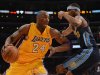 Kobe Bryant (L) helped put the LA Lakers halfway to a berth in the second round heading into games at Denver