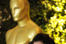 File-In this file photo actress Sean Young posing at the Academy of Motion Picture Arts and Sciences' 2011 Governors Awards, in Los Angeles. Los Angeles police say actress Young, 52, was placed under citizen's arrest after a fight at the official post-Oscars party Sunday evening Feb. 26,2012. The star in 