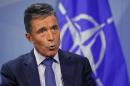 NATO Secretary General Rasmussen speaks during an interview with Reuters at the Alliance headquarters in Brussels
