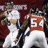 Denver Broncos quarterback Peyton Manning (18) looks for an open receiver against the Atlanta Falcons during the first half of an NFL football game, Monday, Sept. 17, 2012, in Atlanta. (AP Photo/John Bazemore)