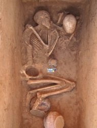 This handout picture released by the Italian archaeological mission shows a skeleton in an ancient grave discovered in Udegram, in northwestern Pakistan's Swat Valley. Archaeologists were aware of a pre-Buddhist grave site in Udegram, but only recently discovered the collection of almost 30 graves, tightly clustered and partially overlapping
