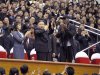 North Korean leader Kim Jong-Un, his wife Ri Sol-Ju and former NBA basketball player Dennis Rodman clap during an exhibition basketball game in Pyongyang