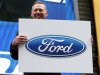 Alan Mulally, President and CEO of Ford Motor Company attends a launch event for the New 2013 Ford Fusion Hybrid car in New York's Times Square
