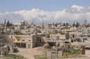 A general view shows Khan al-Assal area near the northern city of Aleppo, near the site where forces loyal to Syria's President Bashar al-Assad say was Tuesday's chemical weapon attack