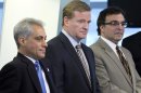NFL Commissioner Roger Goodell, center, is flanked by Chicago Mayor Rahm Emanuel, left, and Ted Phillips, president and CEO of the Chicago Bears, during a news conference where they recognized Soldier Field as the only NFL stadium to become a LEED-certified green building, Thursday, May 31 2012, in Chicago. (AP Photo/Charles Rex Arbogast)