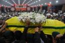 Members and supporters of Lebanon's Shiite militant group Hezbollah, carry the coffin of top Hezbollah commander Mustafa Badreddine who was killed in an attack in Syria at the martyrs' cemetery in Beirut on May 13, 2016