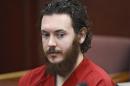 James Holmes sits in court during a hearing at the Arapahoe County Justice Center in Centennial