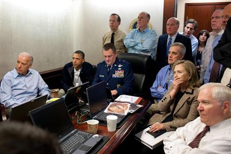 U.S. President Barack Obama (2nd L) and Vice President Joe Biden (L), along with members of the national security team, receive an update on the mission against Osama bin Laden in the Situation Room of the White House, May 1, 2011. REUTERS/White House/Pete Souza/Handout