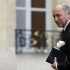 French Foreign Minister Fabius arrives for a Defence Council meeting at the Elysee Palace in Paris
