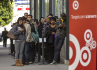 <p> In this Thursday, Jan. 10, 2013, photo, hundreds of prospective candidates await their turn to apply for job openings at a Target job fair in Los Angeles. Target reports its quarterly earnings on Wednesday, May 22, 2013. (AP Photo/Damian Dovarganes)