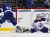 Tampa Bay Lightning's Purcell shoots past Edmonton Oilers goalie Khabibulin during the shootout in their NHL hockey game in Tampa
