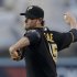 Pittsburgh Pirates starting pitcher Gerrit Cole throws to the Los Angeles Angels during the first inning of a baseball game in Anaheim, Calif., Friday, June 21, 2013. (AP Photo/Chris Carlson)