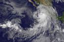 Hurricane Newton was packing wind speeds of 90 miles (145 kilometers) per hour as it approached Mexico