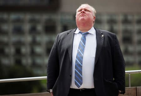 Toronto Mayor Ford attends a gay rights flag raising event at Toronto City Hall