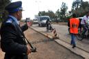 A Moroccan police officer mans a roadblock at one of the entrances to the city of Marrakesh on May 3, 2011