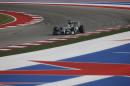 Mercedes driver Lewis Hamilton, of Britain, drives his car around a corner during the Formula One U.S. Grand Prix auto race at the Circuit of the Americas, Sunday, Nov. 2, 2014, in Austin, Texas. (AP Photo/David J. Phillip)