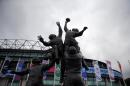 A rugby players statue is setup in front of the Twickenham Stadium, London, Tuesday, Sept. 15, 2015. The Rugby World Cup starts Friday, Sept. 18, with England playing Fiji, and ends with the final on Oct. 31. (AP Photo/Christophe Ena)