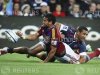Vuna of Australia's Rebels fails to prevent Piutau of New Zealand's Highlanders from scoring during their Super 15 rugby union match in Melbourne