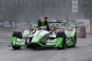 Sebastien Bourdais, of France, drives in the rain during the second race of the IndyCar Detroit Grand Prix auto racing doubleheader Sunday, May 31, 2015, in Detroit. (AP Photo/Dave Frechette)